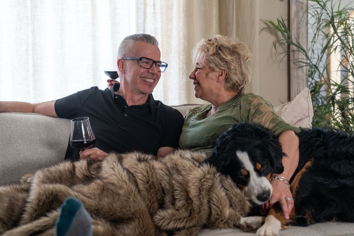 Tim and Tracy at home with their dog